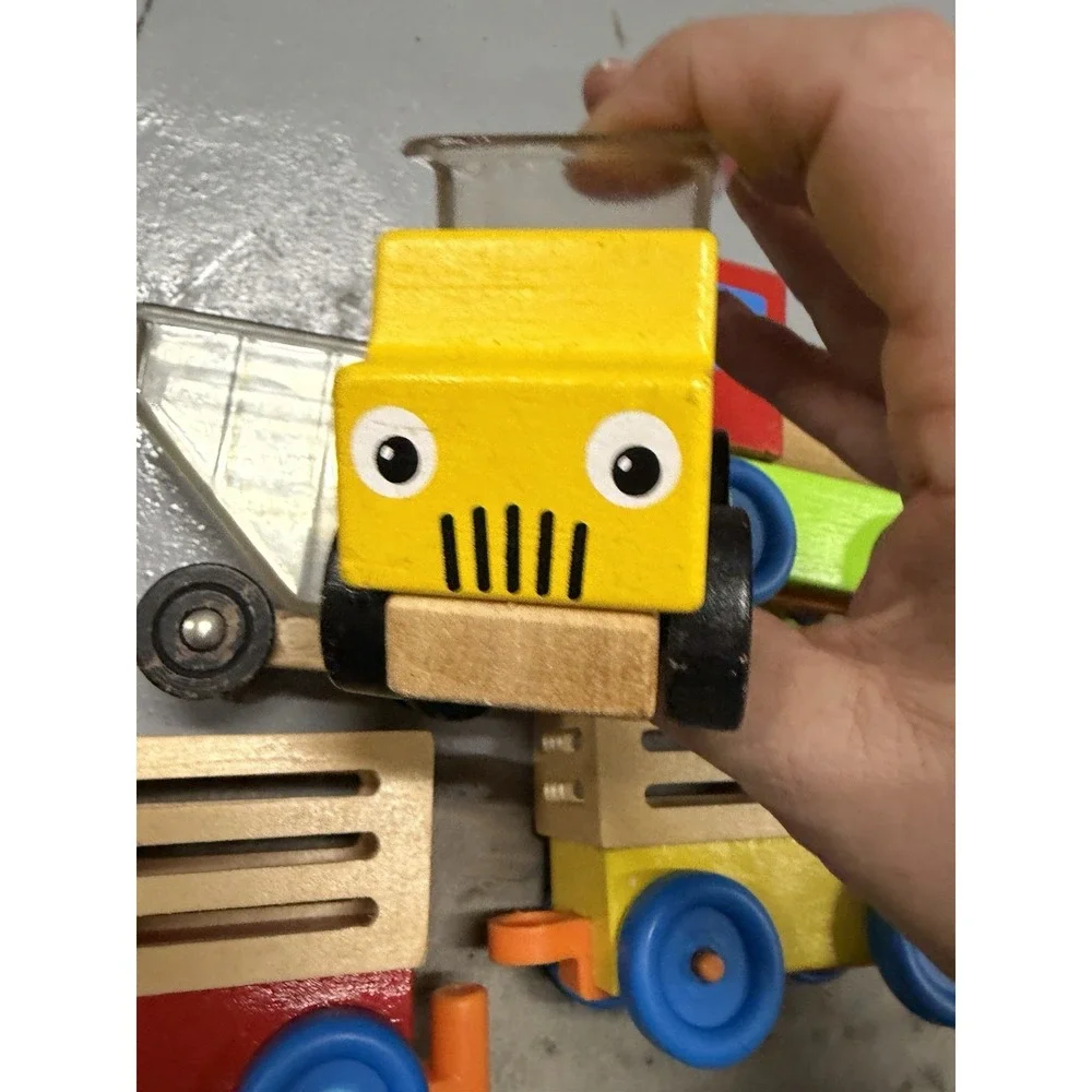 Melissa & Doug dump trucks